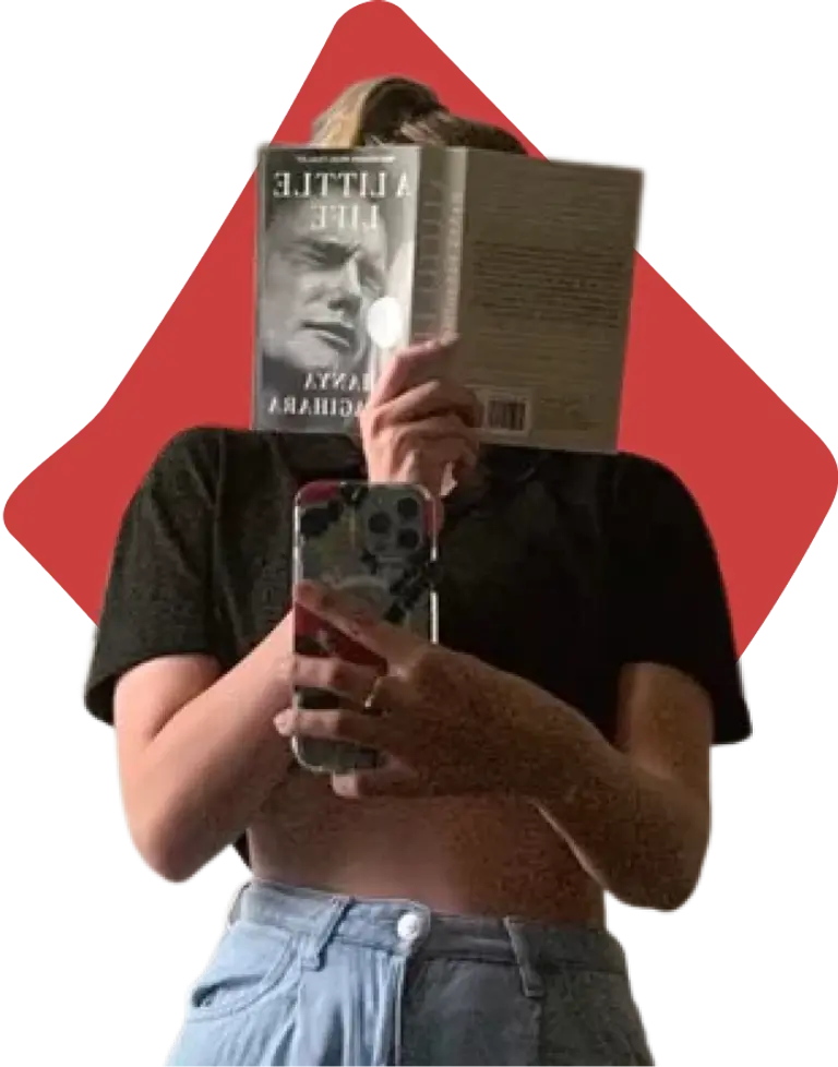 person reading book red shape